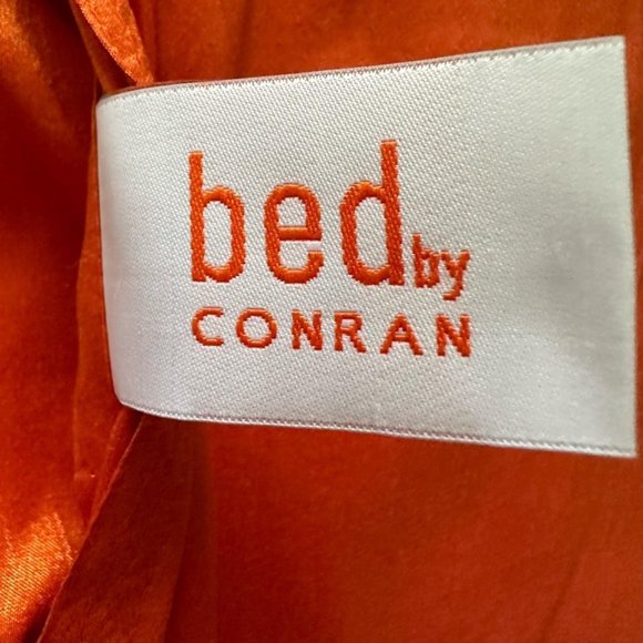 Orange accent throw pillow, Bed by Conrad Collection. - Picture 5 of 7